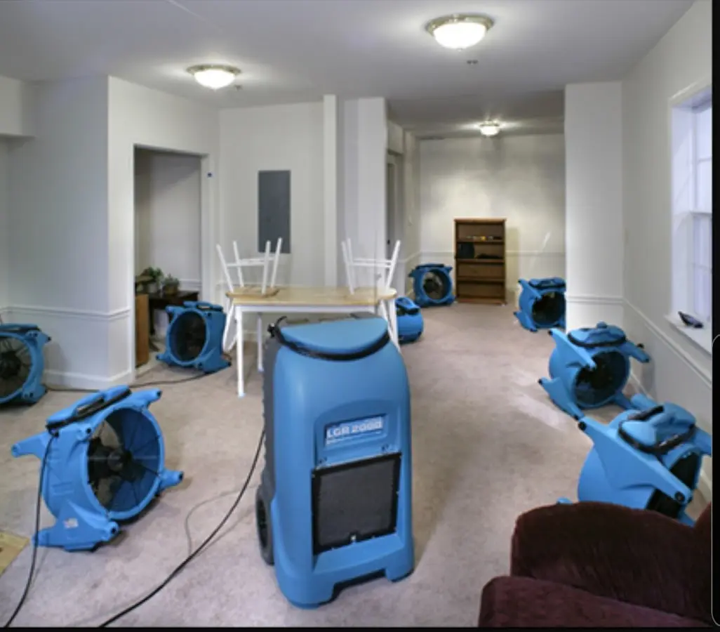 Air movers and dehumidifier setup for Water Damage Restoration in Fort Madison